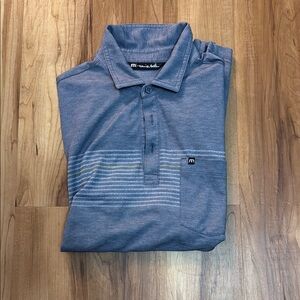 Travis Mathew Blue Polo Shirt with Subtle Stripes